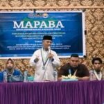 Ketum IKA PMII Cabang Kota Gorontalo, Muchlis S.Huntua saat membuka kegiatan MAPABA PMII Rayon Adam Smith dan Rayon Maritim di Aula Kecamatan Sipatana. (Foto: Annahdlah)